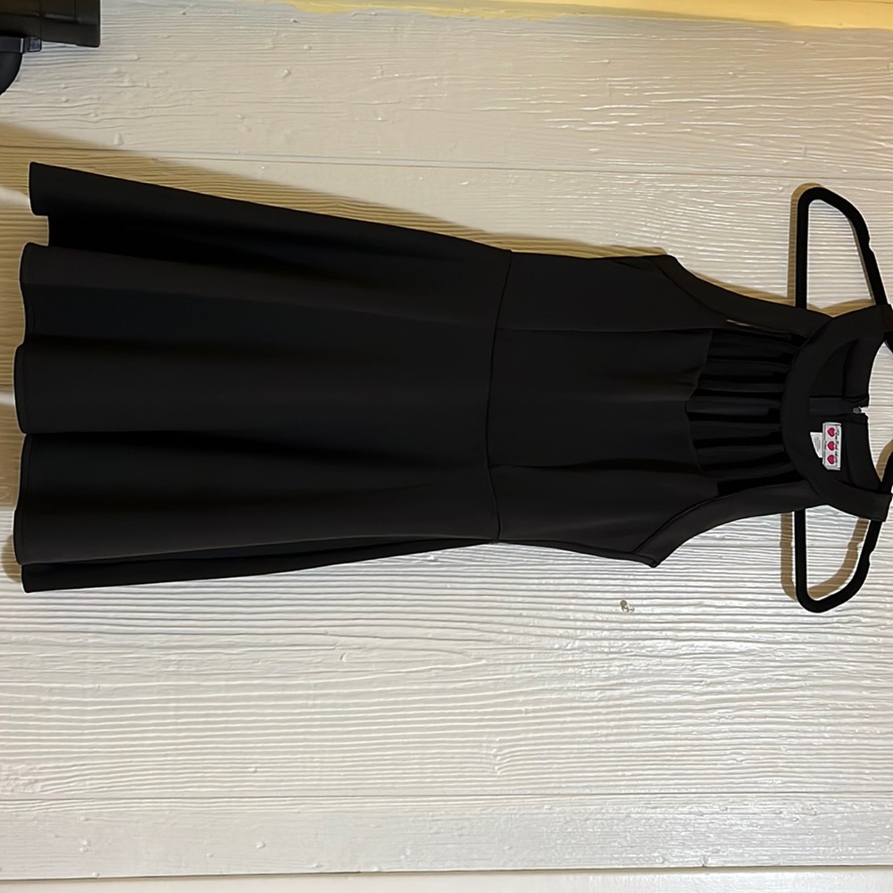 Dress with cage neck line